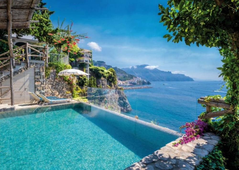 The Italy Few Will Ever Touch: 5-Star Resorts, Roads Built for Legends, and a Ferrari That&rsquo;s Already Yours.